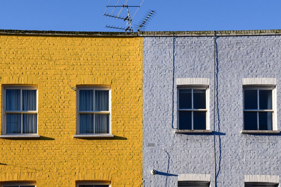 Row of painted house fronts in bright colours