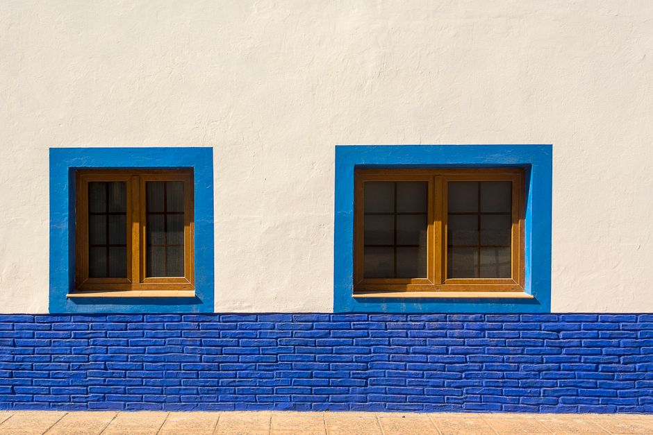 Painted window frames on a white wall